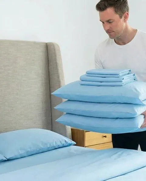 Freshly washed and folded thick winter comforters