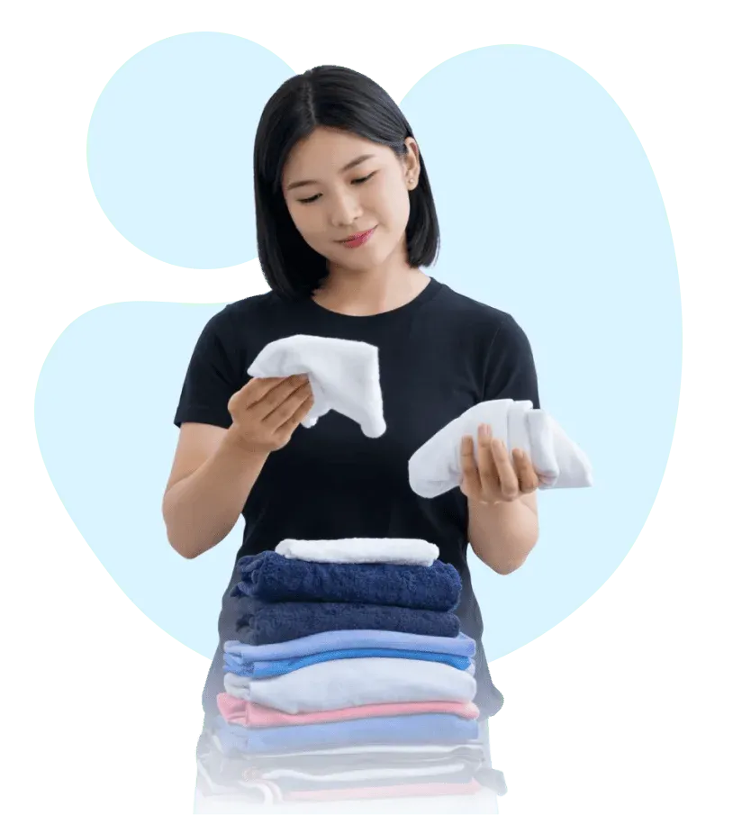 Freshly folded laundry stack representing our premium wash and fold service