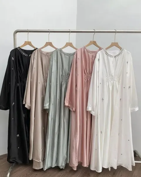 Elegant evening dresses and formal wear prepared for professional dry cleaning